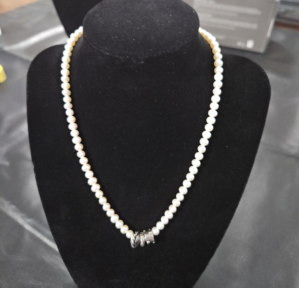 Pearl Strand Necklace with Silver Charms